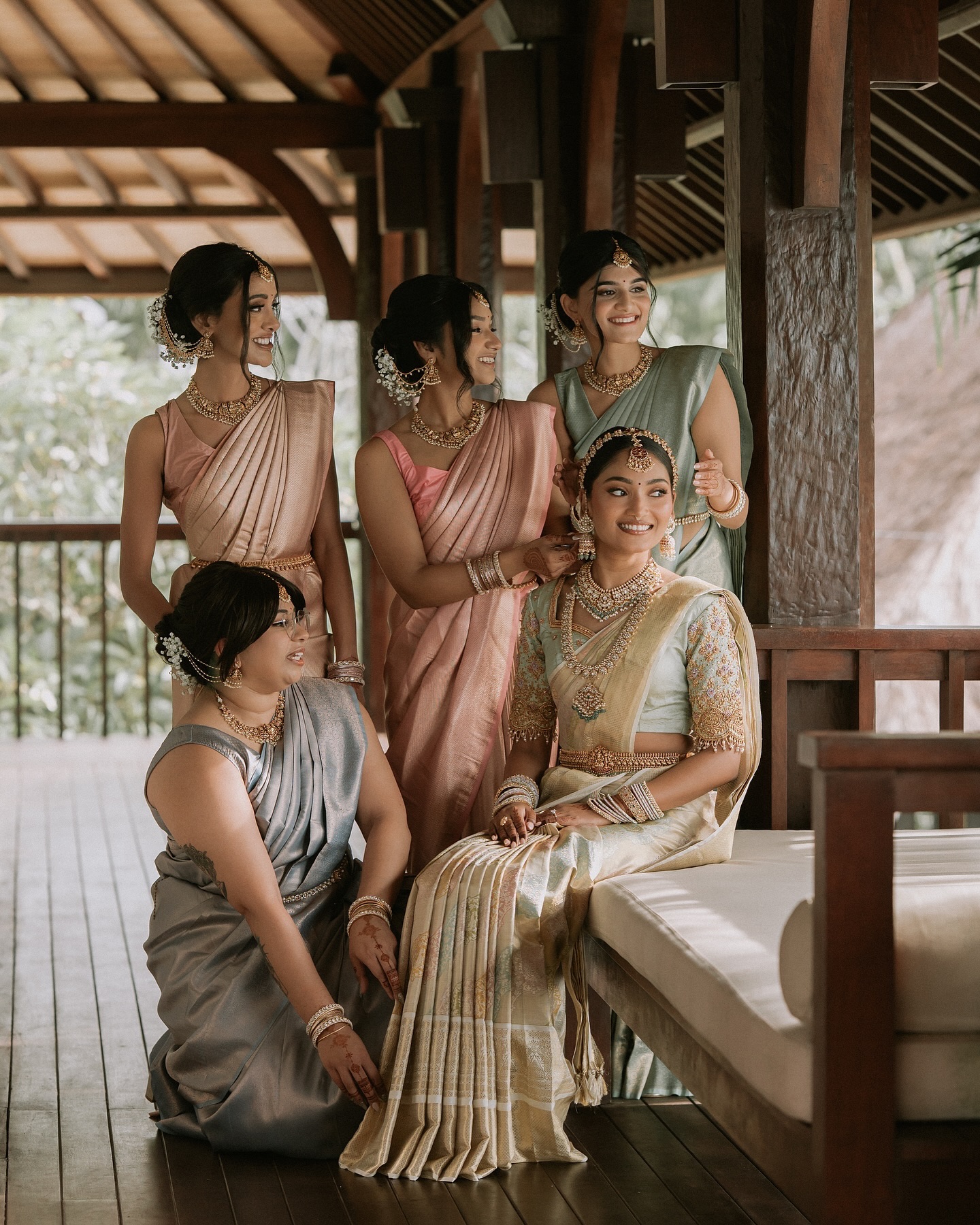 Burgundy-toned wedding tablescape with tropical flowers and dinner styling